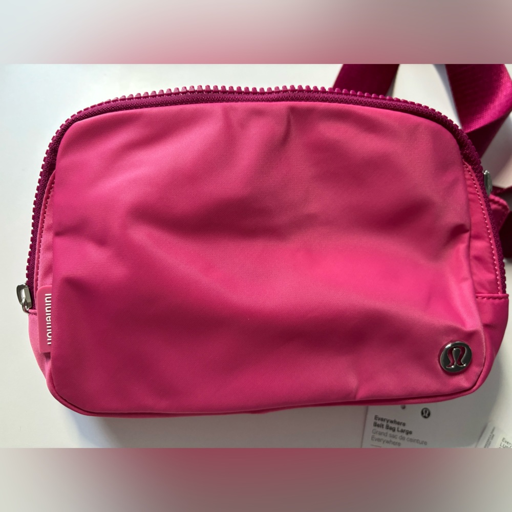 Lululemon Everywhere belt bag 2L in Raspberry Coulis. Brand New, never worn.